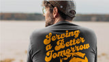 Patrice Plante, founder of NOA, wearing a Serving a Better Tomorrow t-shirt